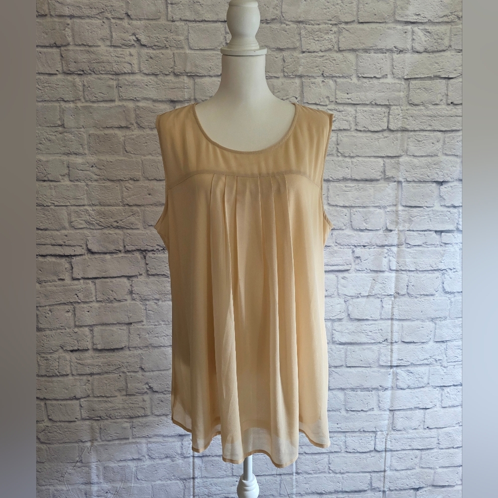 Elegant Sleeveless Cream Blouse